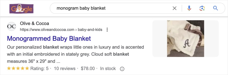 Search results for the query monogram baby blanket shows a listing with a picture of the blanket with the letter A. 