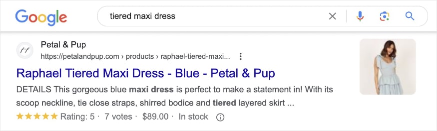 Product review snippet on the serp for the search query tiered maxi dress.